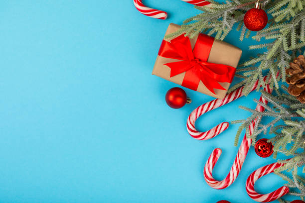 istock Christmas candy. Christmas composition with gifts, Christmas tree decorations on  background. Concept for Christmas and New Year holidays. Winter. Flat lei, top view, copy space. 1869503641
