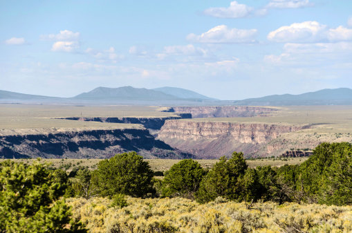 The Rio Grande gorge, part of the Rio Grande del Norte National Monument, cuts through the Taos plateau near Taos, New Mexico.