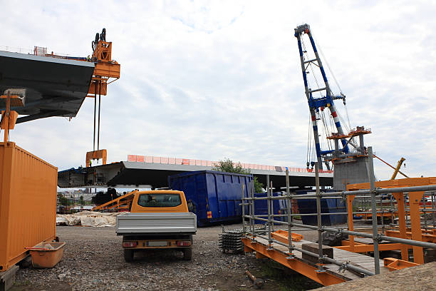 istock bridge pices put together with help of cranes 186951708