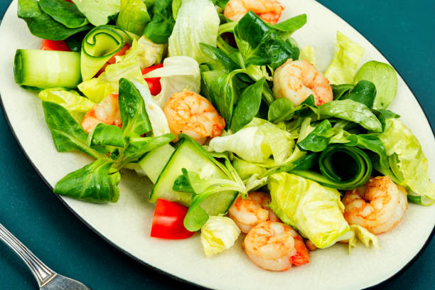 istock Delicious fresh salad with prawns 1869517103