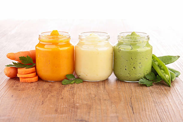 istock Jars filled with baby food made from veggies 186951723