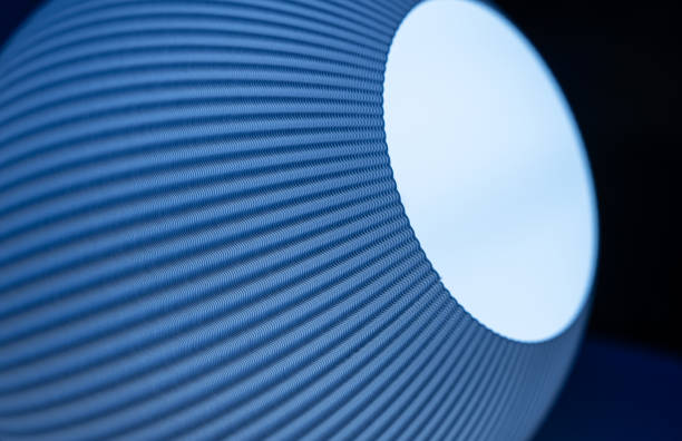 Germany, Berlin,  December 17, 2023 - Close-up of round lamp against black background