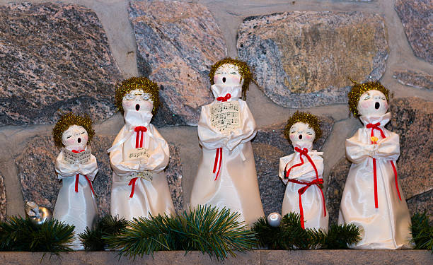 Christmas dolls singing carols stock photo