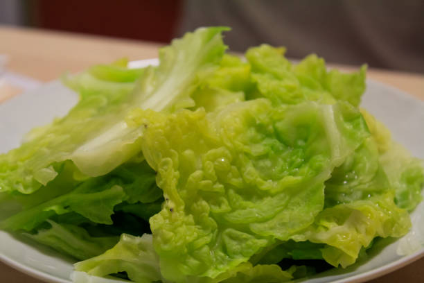 istock Close-up of the stir-fried lettuce. A dish for dinner. 1869577219