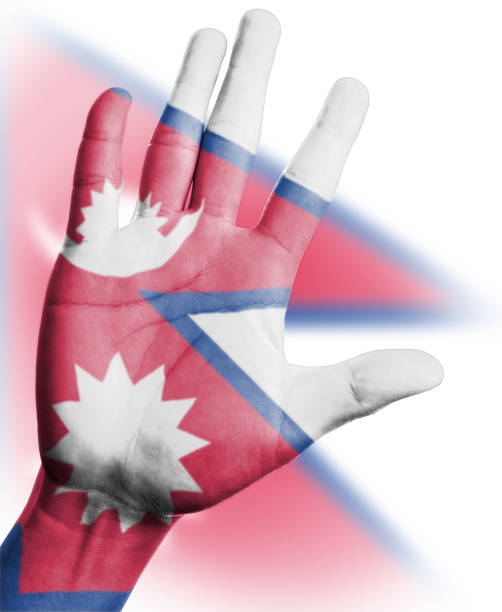 Cheering fan with Painting national Nepal  flag with your hand with your hand for cheer your national sport