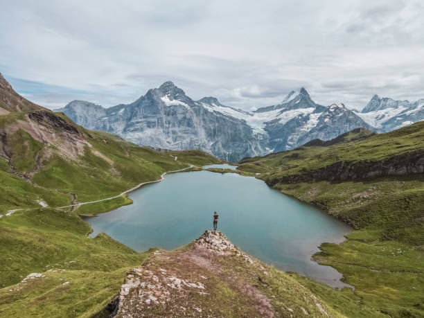 istock Lake in Switzerland, mountains 1869593737