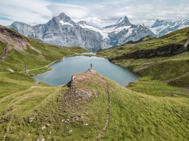 istock Lake in Switzerland, mountains 1869594769
