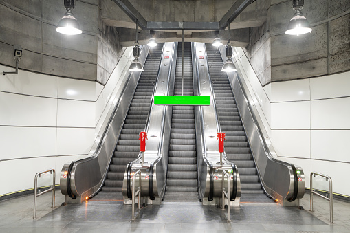 Empty escalators in subway station