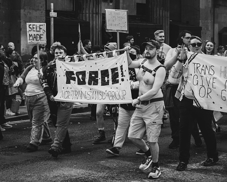 Image of people taking part in the Manchester Pride Parade, 2023. 
Manchester Pride is a charity that campaigns for LGBTQ+ equality across the United Kingdom, predominantly in Greater Manchester

Manchester, UK - August 26th, 2023