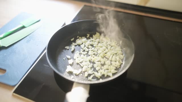 Sauting onion in a pan
