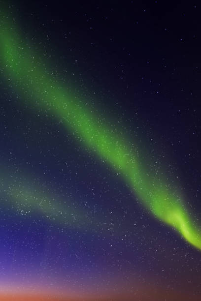 Green aurora borealis Night blue starry sky and Northern lights aurora borealis orange stock illustrations