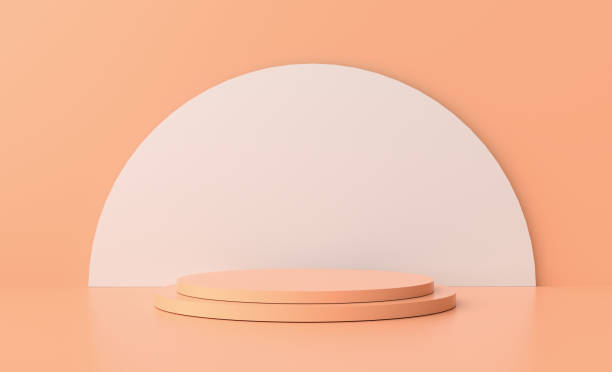 istock peach color colored round podium or pedestal with white background. 1869656337