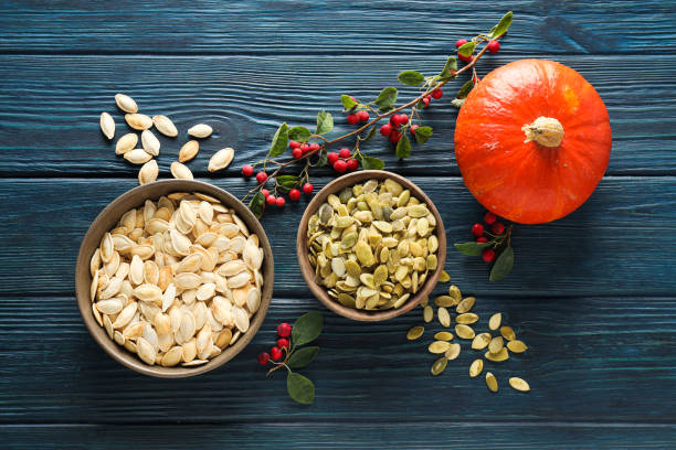 istock Cooking ingredients for fall season - pumpkin seeds, pumpkin 1869661921