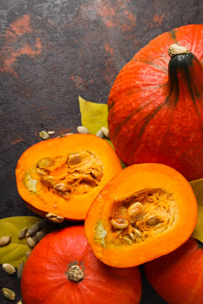 istock Cooking ingredients for fall season - pumpkin seeds, pumpkin 1869667854