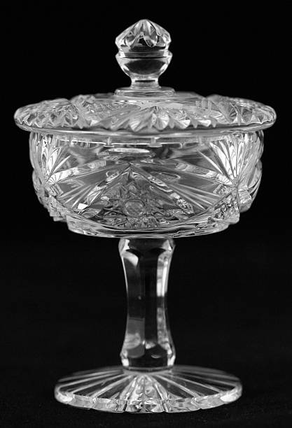 Antique bright crystal holder with lid Antique bright crystal holder with lid isolated on black background crystal chalice stock pictures, royalty-free photos & images