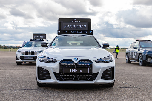 Berlin, Germany - September 23, 2023: A picture of a BMW i4 serving as one of the timing cars of the 2023 Berlin Marathon.