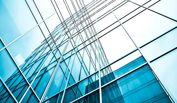 istock underside view to steel glass high rise building 186968312