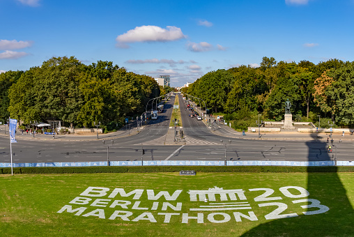 Berlin, Germany - September 24, 2023: A picture of the 2023 Berlin Marathon sign on the grass surrounding the Victory Column.