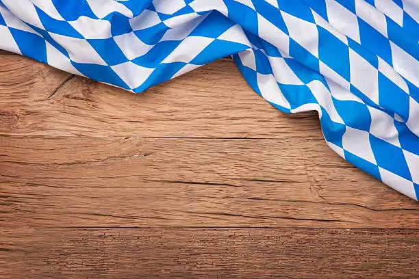 Beer Fest blue checkered fabric on wooden background