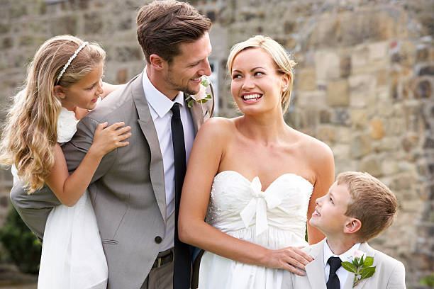 istock Happy newly married couple with children 186970098