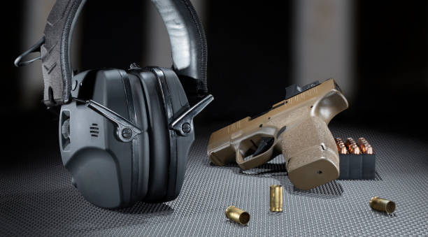 istock Targets downrange with hearing protection and pistol 1869701364