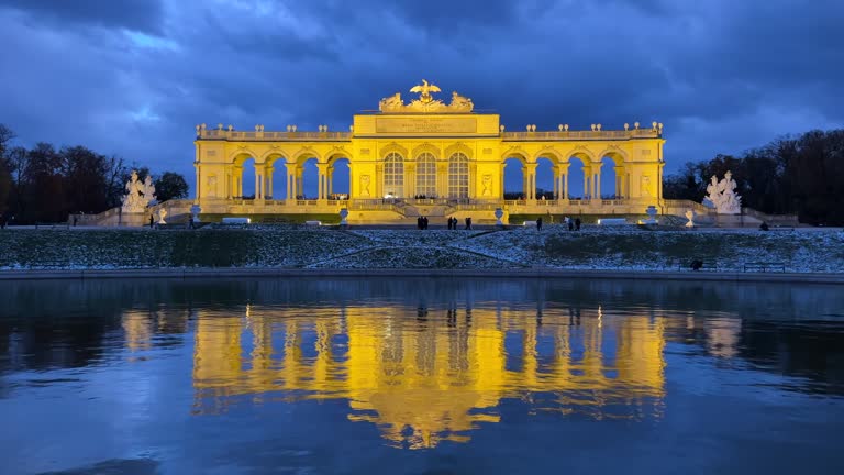 Gloriette with reflection in pond