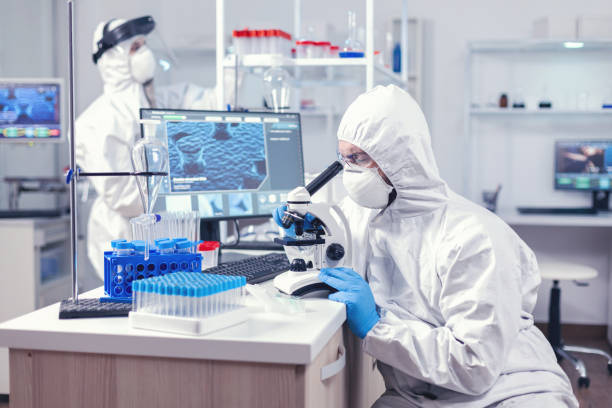 istock Man in ppe equipment conducting coronavirus investigation 1869708895
