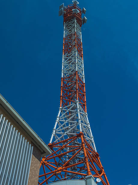 istock colorful high television towers on blue sky 186971401