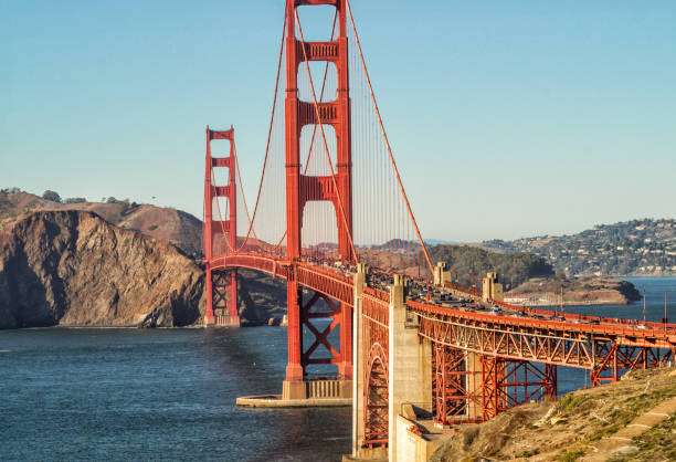 view of the golden gate bridge, san francisco, usa from baker beach, - traffic car travel golden gate bridge - fotografias e filmes do acervo