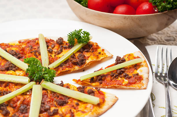 istock Turkish beef pizza with cucumber on top 186972137
