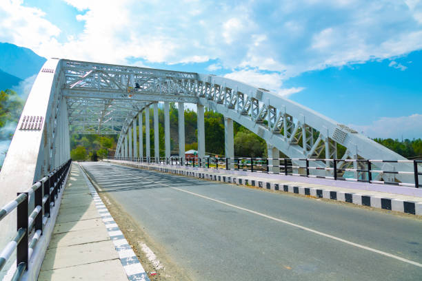 istock Wayil bridge road with blue cloudy sky in background. 1869726504