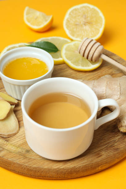 istock Cold treatment, healthcare concept - tea with ginger 1869726509