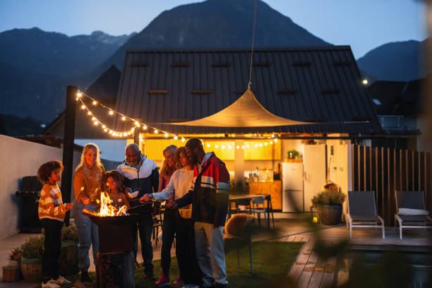 istock Happy Moments Roasting Marshmallows At Night 1869727599