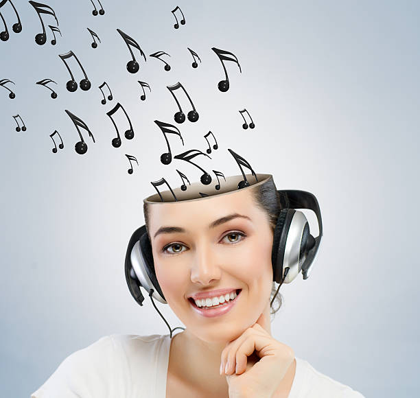istock girl with headphones 186972801