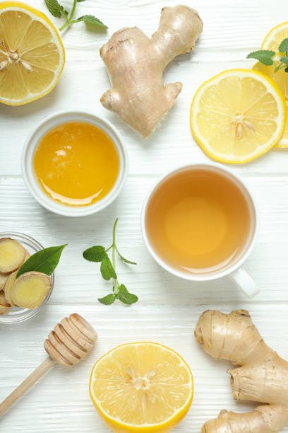 istock Cold treatment, healthcare concept - tea with ginger 1869730270