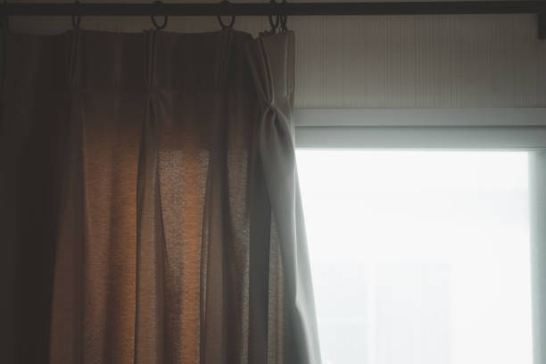istock Brown curtains in home 1869737938
