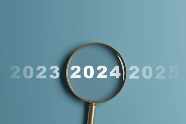 istock 2024 year inside of magnifier glass 1869738458
