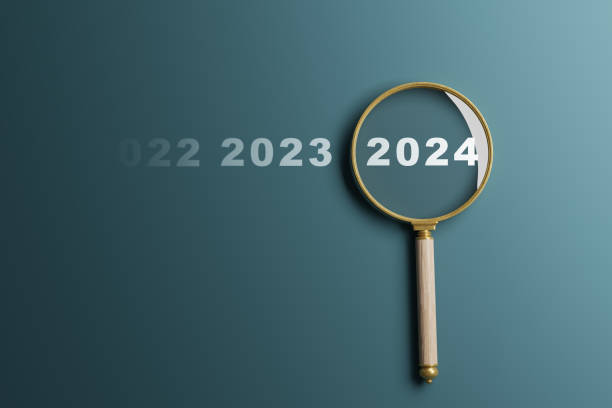 istock 2024 year inside of magnifier glass 1869740628