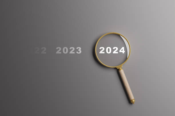 istock 2024 year inside of magnifier glass 1869740634