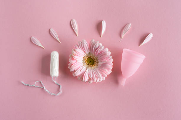 istock Tampons and menstrual cup on pink background 1869741175