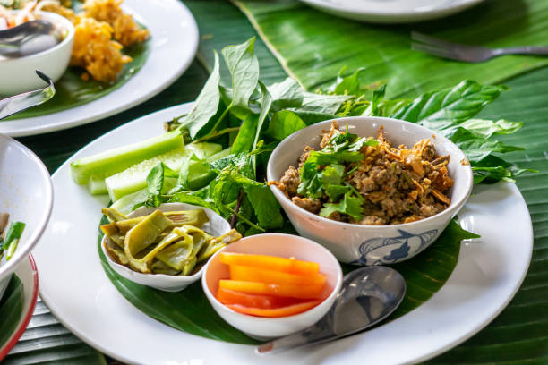 istock Spicy minced fish salad in dish. Thai food 1869742235
