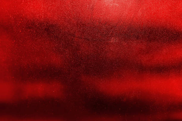 istock red cosmic background. black dark green blue brown shiny glitter abstract background with space. Twinkling glow stars effect. Like outer space, night sky, universe. Rusty, rough surface, grain. 1869742258