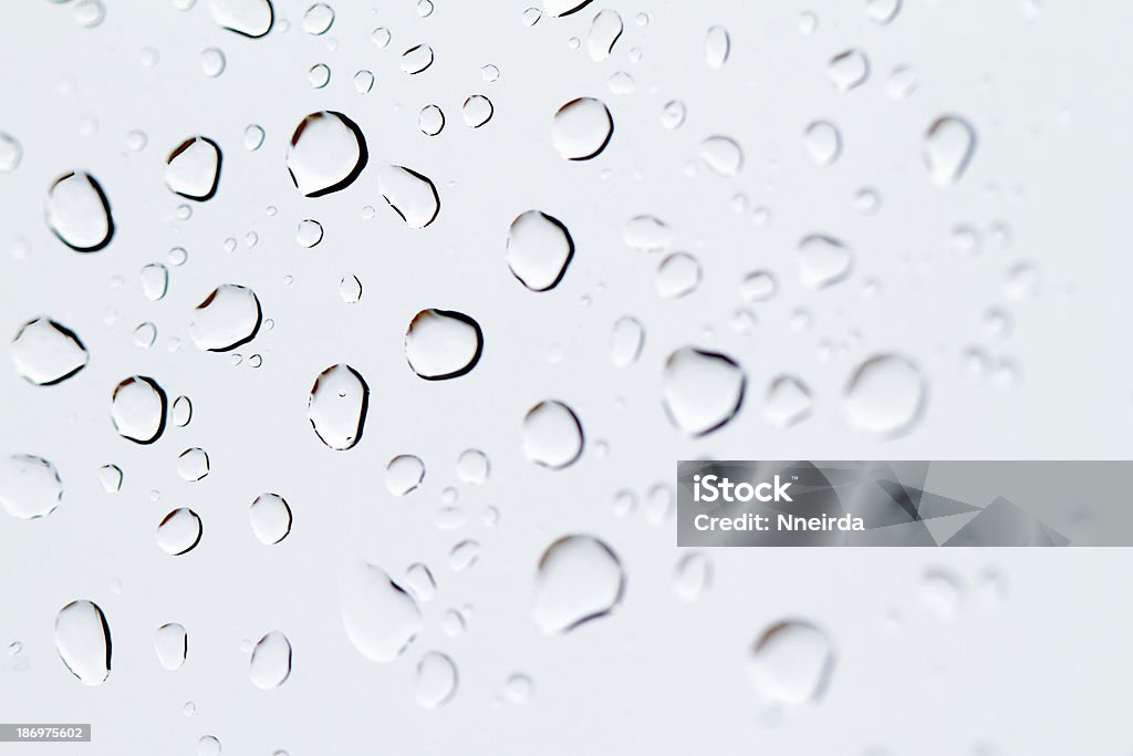 Gocce d'acqua sul vetro - Foto stock royalty-free di Acqua