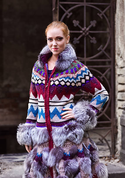 istock girl in a knitted coat 186975941
