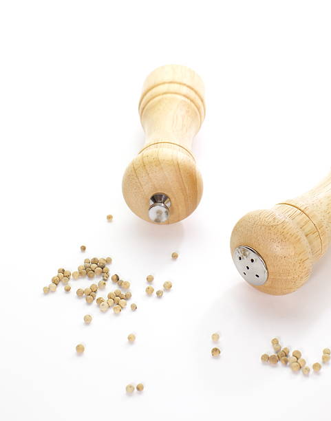 istock Wood pepper mill and salt shaker isolated on white 186976531