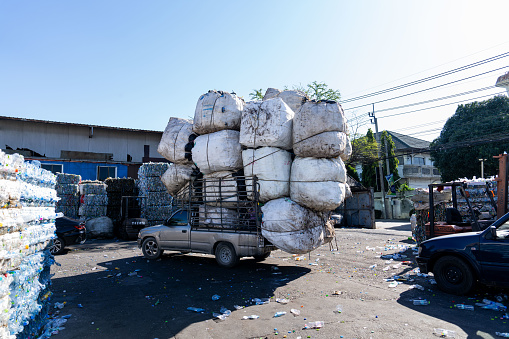 A truck delivers a load of plastic bottles to a sorting and compacting facility in Bang Phli, Samut Prakan, Thailand on December 20, 2023. Thailand is one of the world's biggest polluters. Out of the 8 million tons of waste the country generates, only 25% is recycled, and over 50,000 tons end up in the ocean every year. However, the Thai Government implemented a plan to ban all plastic imports by 2025, which has already resulted in a decrease in imported plastic into the Kingdom, which imported 180,000 tons in 2022. bottles to a sorting and compacting facility in Bang Phli, Samut Prakan, Thailand on December 20, 2023. Thailand is one of the world's biggest polluters. Out of the 8 million tons of waste the country generates, only 25% is recycled, and over 50,000 tons end up in the ocean every year. However, the Thai Government implemented a plan to ban all plastic imports by 2025, which has already resulted in a decrease in imported plastic into the Kingdom, which imported 180,000 tons in 2022.