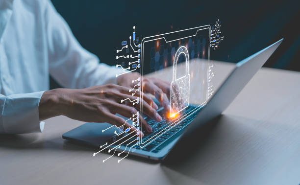 istock Businessman using digital tablet protecting business and financial data with virtual network connection. 1869774038