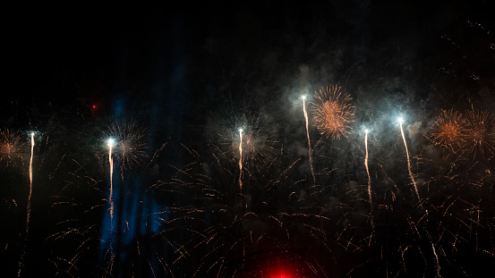 Bright sparks against black background