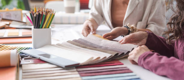 istock Interior designers checking fabric swatches 1869798885