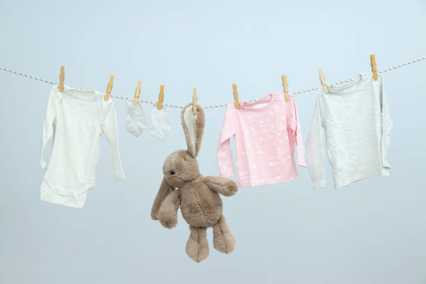 istock Washed, clean clothes are dried on the line. 1869805058